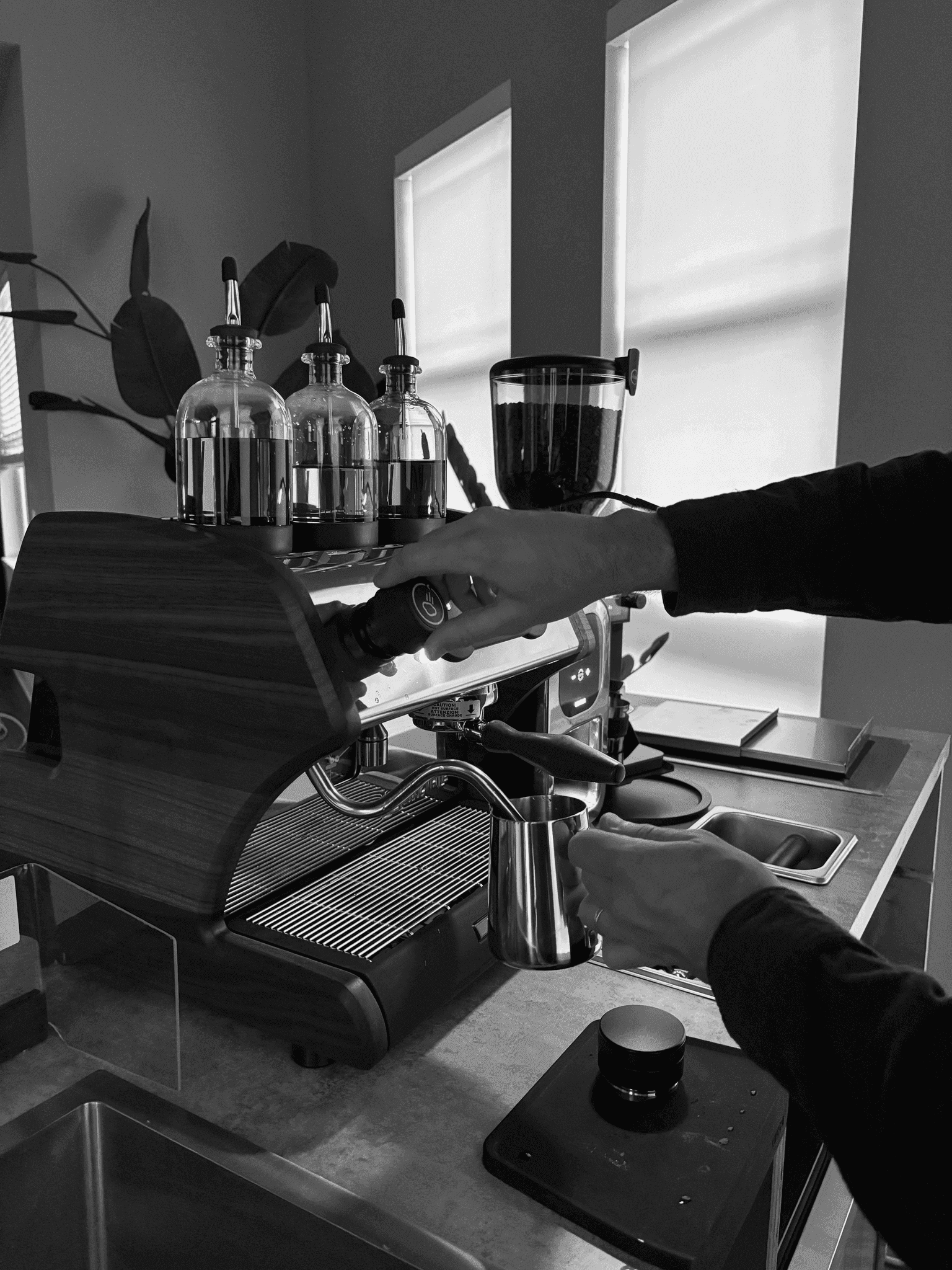 Pulling an espresso shot with a La Marzocco machine